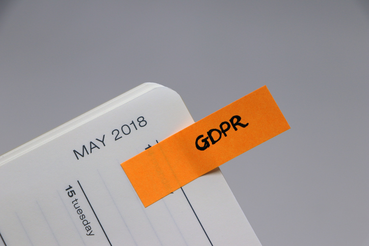Image of a calendar for May 2018 with an orange paper and the letters "GDPR"