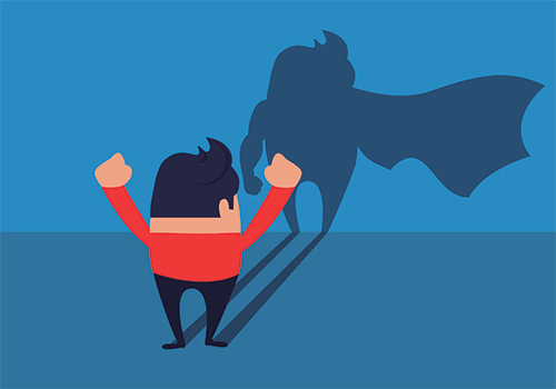 silhouette of super hero graphic with shadow on blue background